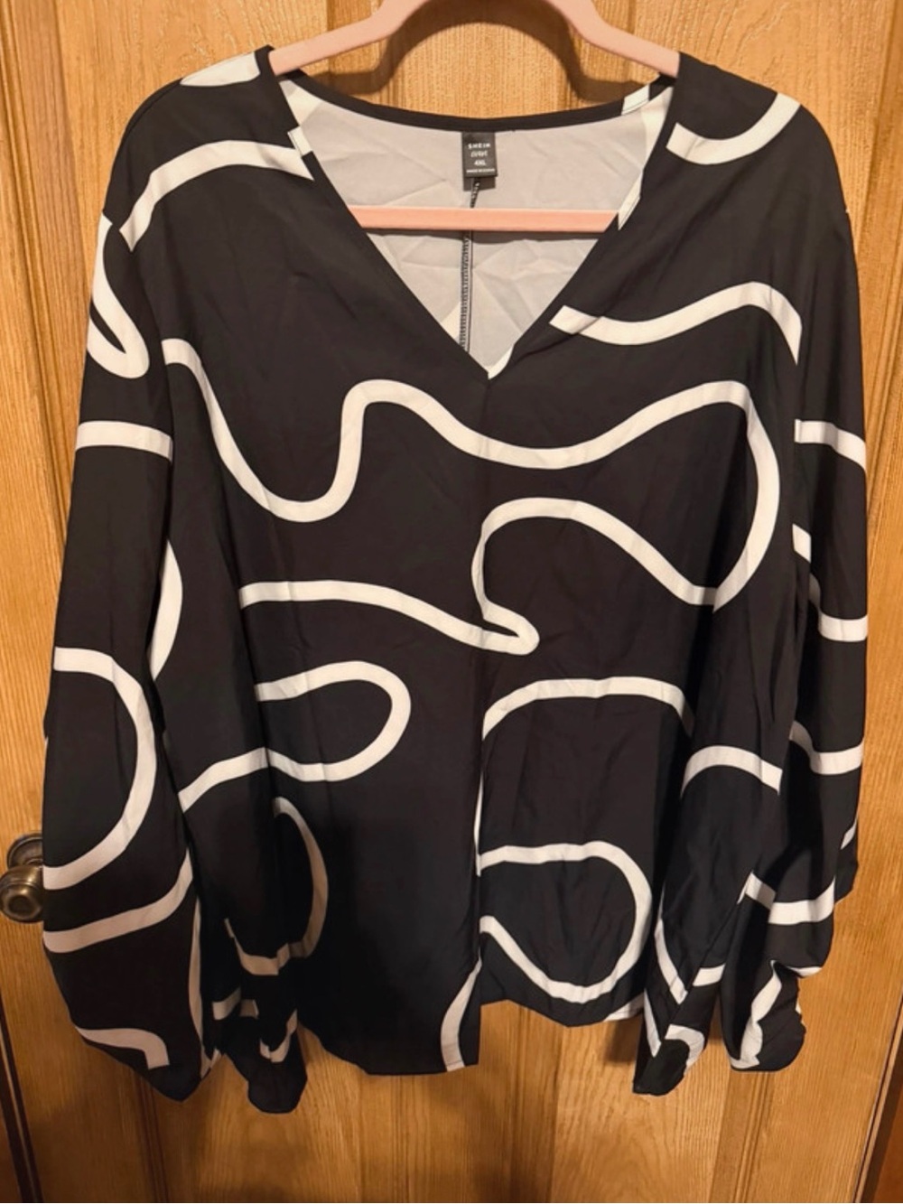 Vince Black Tunic with White Abstract Swirl Pattern